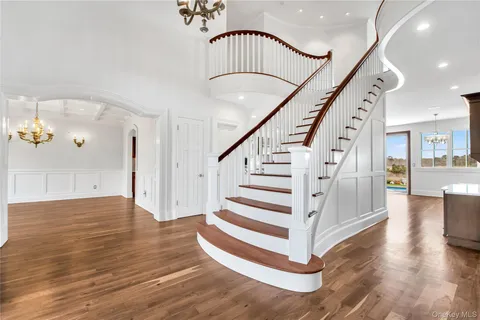 a view of entryway with wooden floor