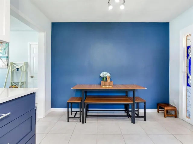 a kitchen with a refrigerator a sink and dishwasher