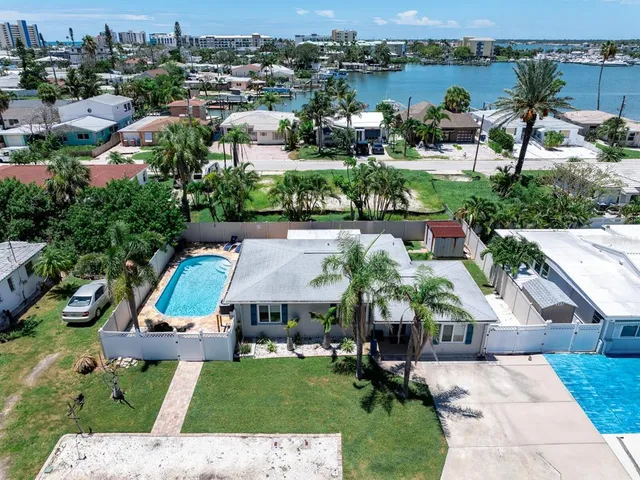 an aerial view of a houses with outdoor space