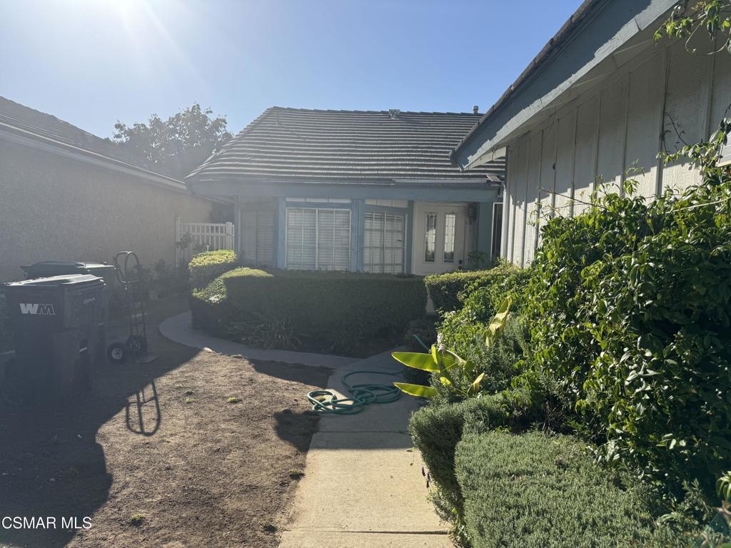 4529 North Canyonlands Road Moorpark, CA 93021 - Photo 2 of 15 a view of a small yard in front of a house