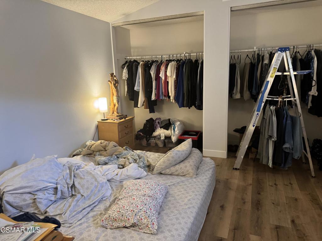 4529 North Canyonlands Road Moorpark, CA 93021 - Photo 6 of 15 a bed room with a bed and a walk in closet