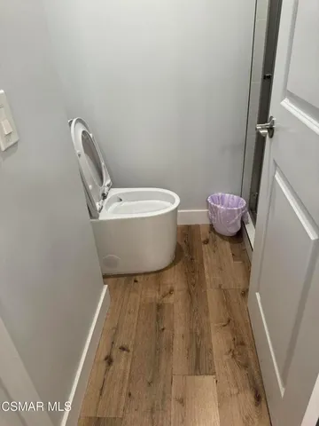 a bathroom with a sink and toilet