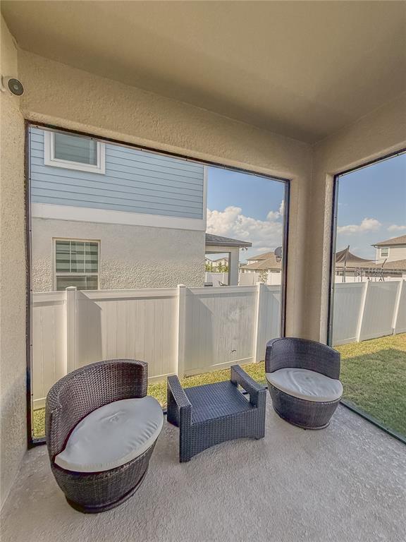 2310 Raven Rdg Drive Minneola, FL 34715 - Photo 19 of 21 a living room with furniture and a window