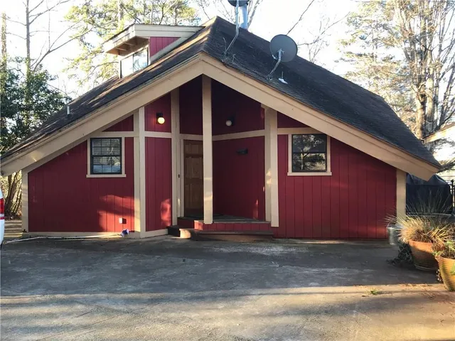 a front view of house with garage