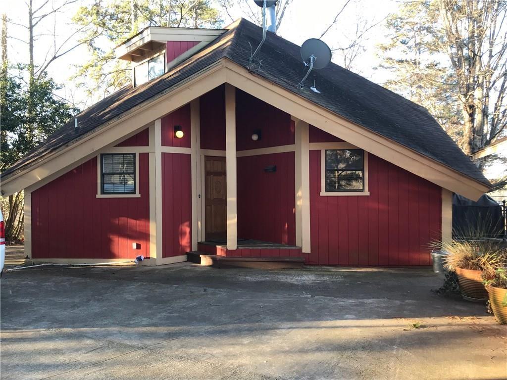 a front view of house with garage