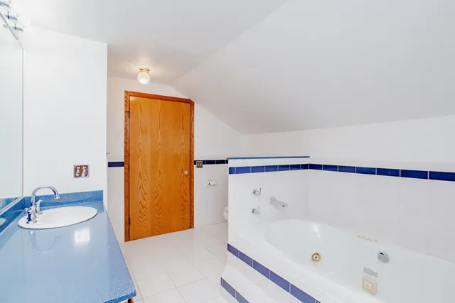 a bathroom with a sink and a tub