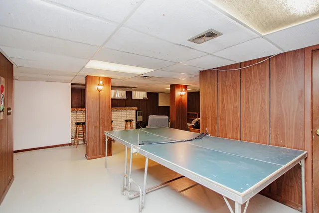 a kitchen with a stove and a refrigerator