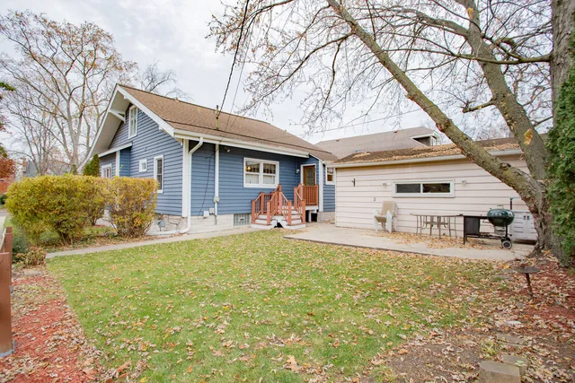 a view of a yard with swimming pool