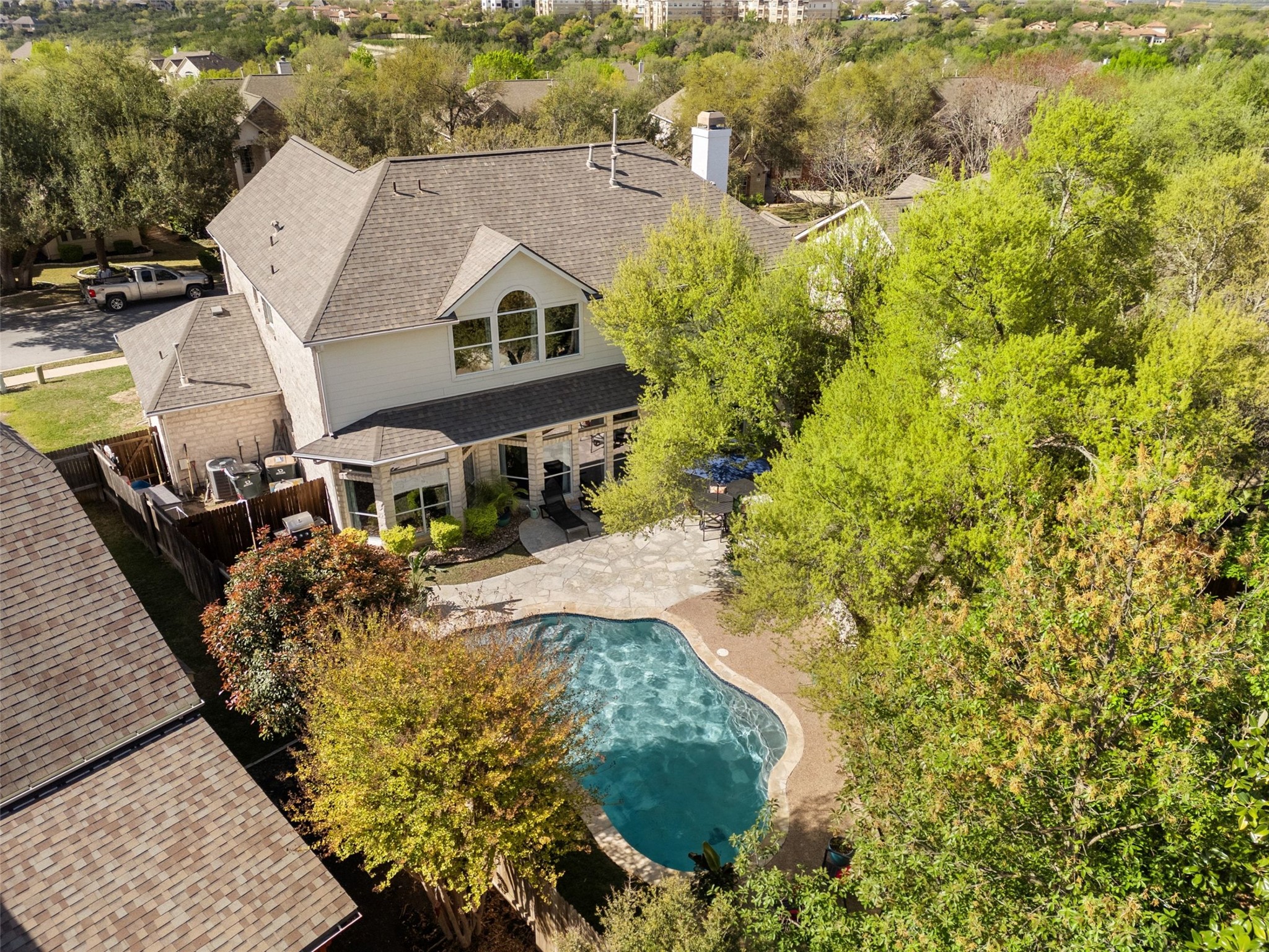 12510 Bright Sky Overlook Austin, TX 78732 - Photo 2 of 39 an aerial view of a house with a yard basket ball court and outdoor seating