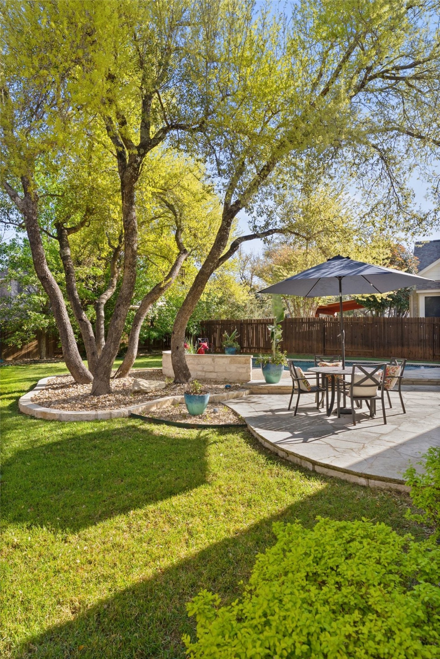 12510 Bright Sky Overlook Austin, TX 78732 - Photo 38 of 39 a view of a swimming pool with a patio