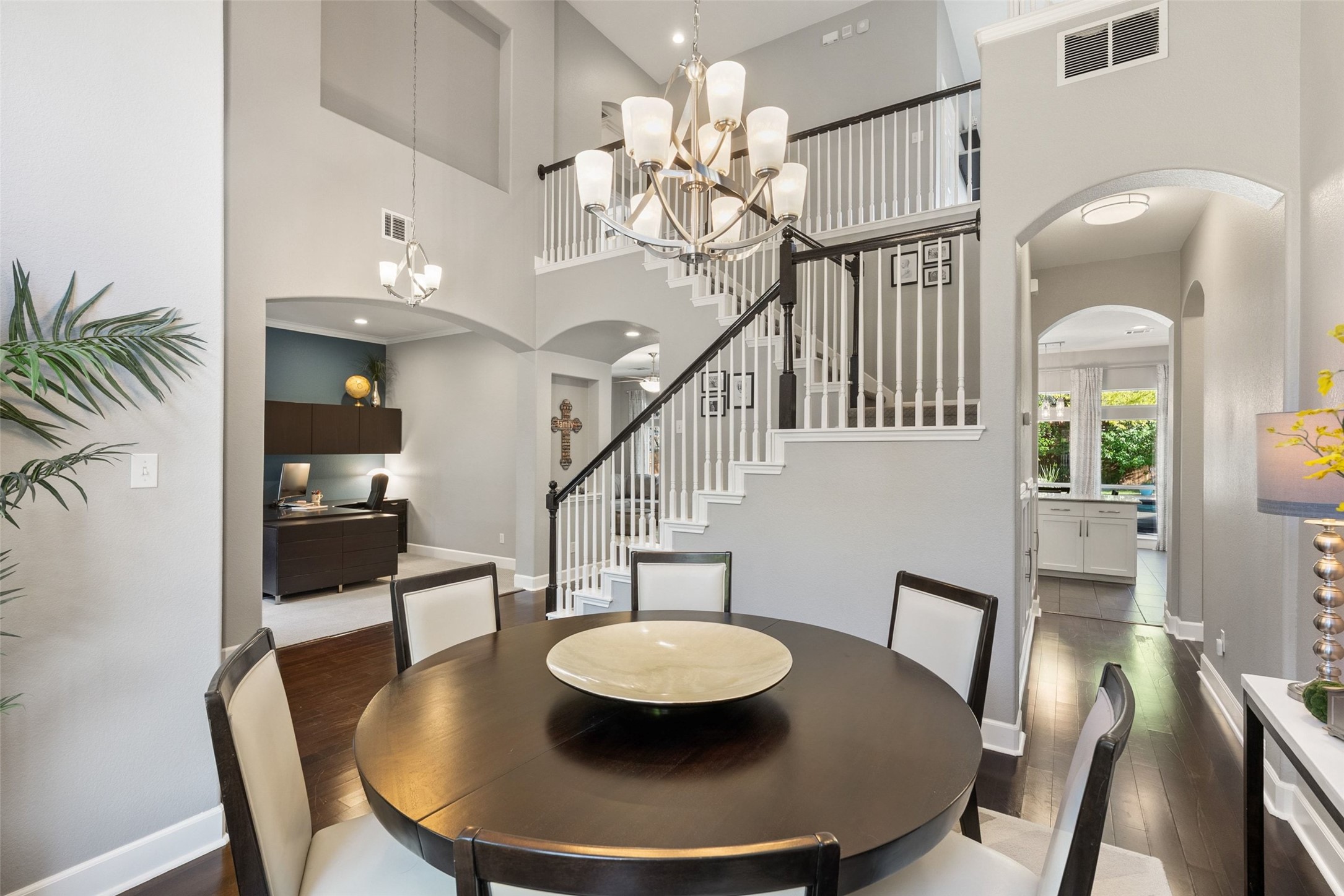 12510 Bright Sky Overlook Austin, TX 78732 - Photo 10 of 39 a view of a dining room with furniture and wooden floor