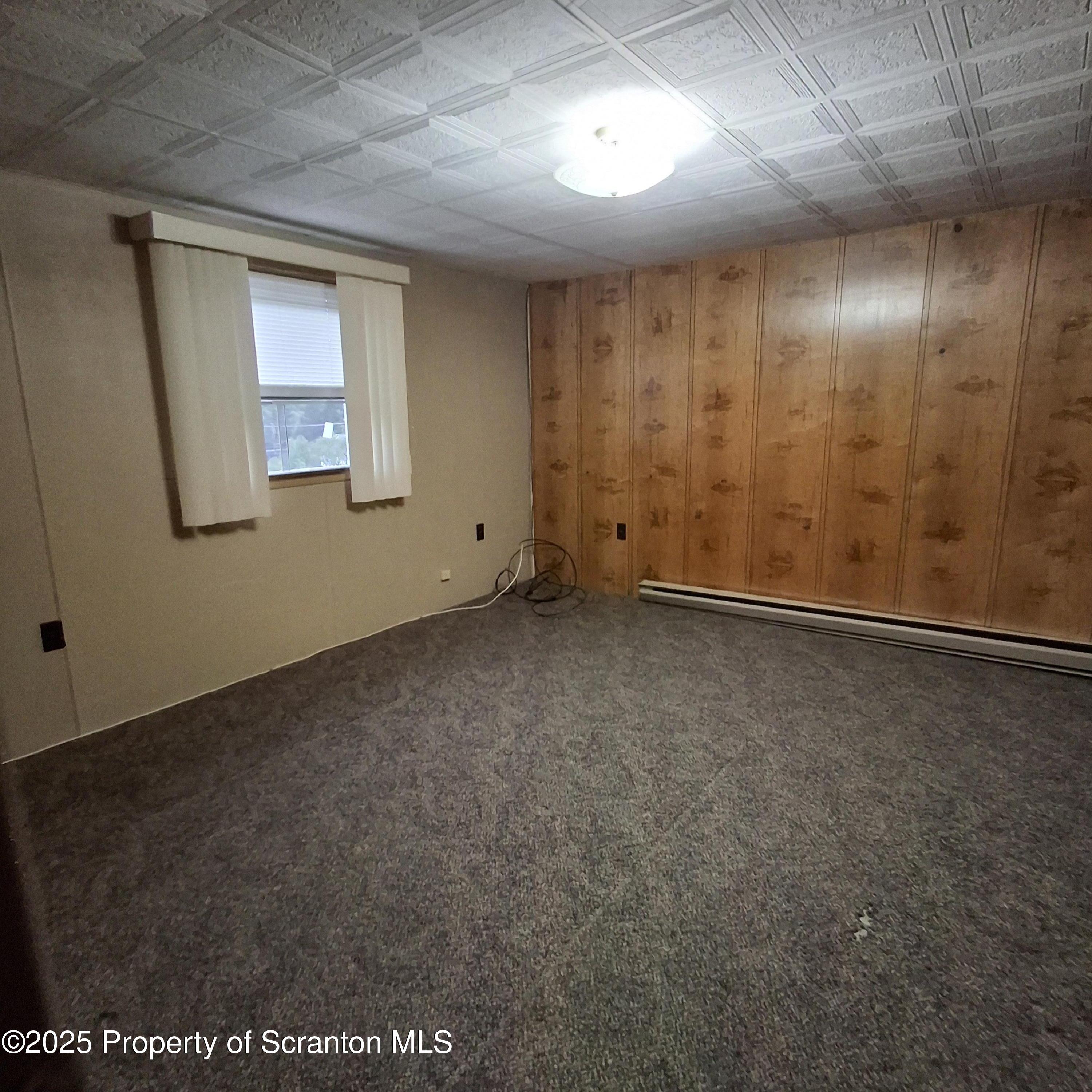 200 Poplar Street, Unit L 6 Archbald, PA 18403 - Photo 21 of 28 an empty room with windows
