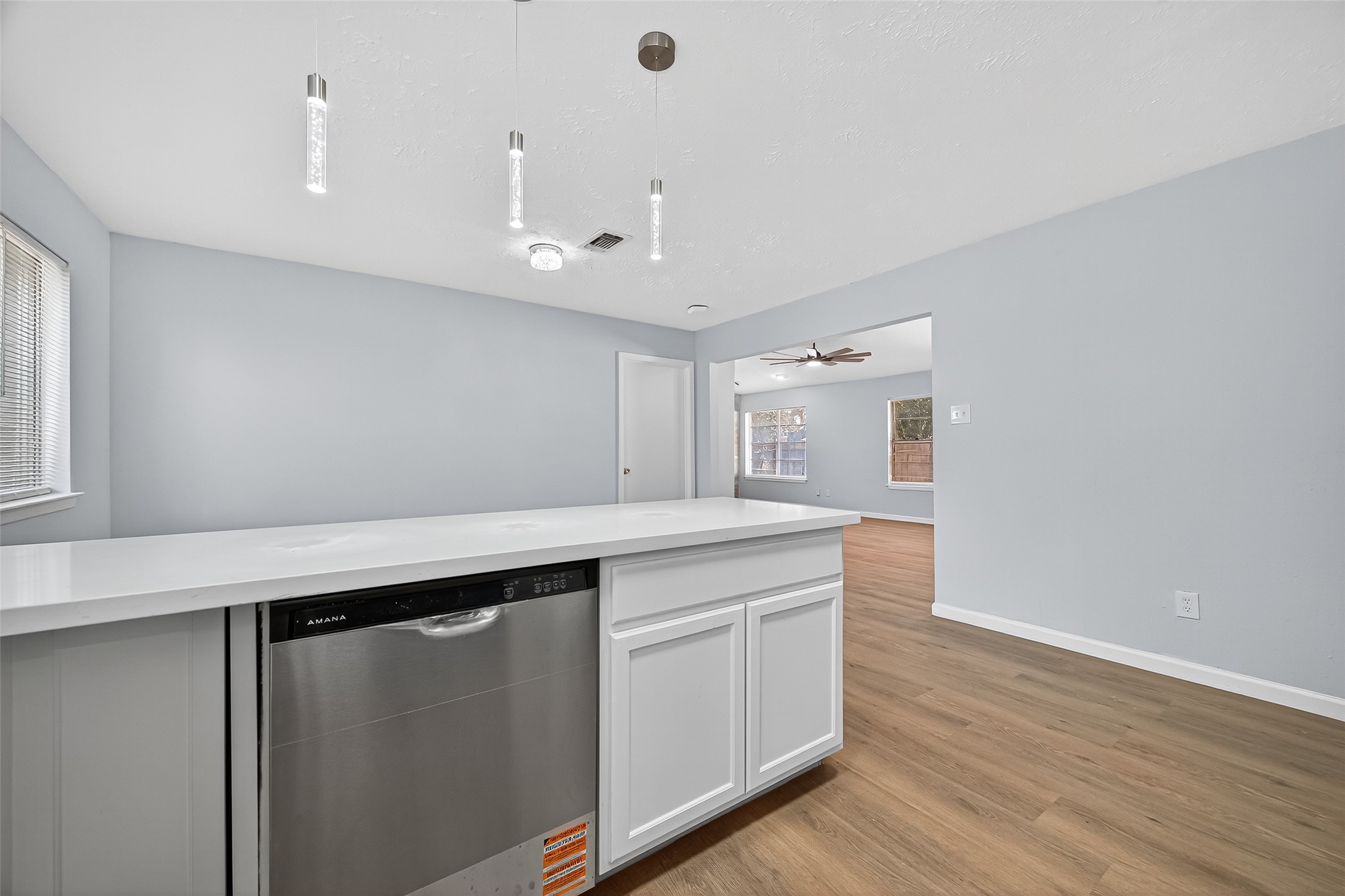 11622 Old Telegraph Road Houston, TX 77067 - Photo 26 of 38 a kitchen with a wooden floor and window