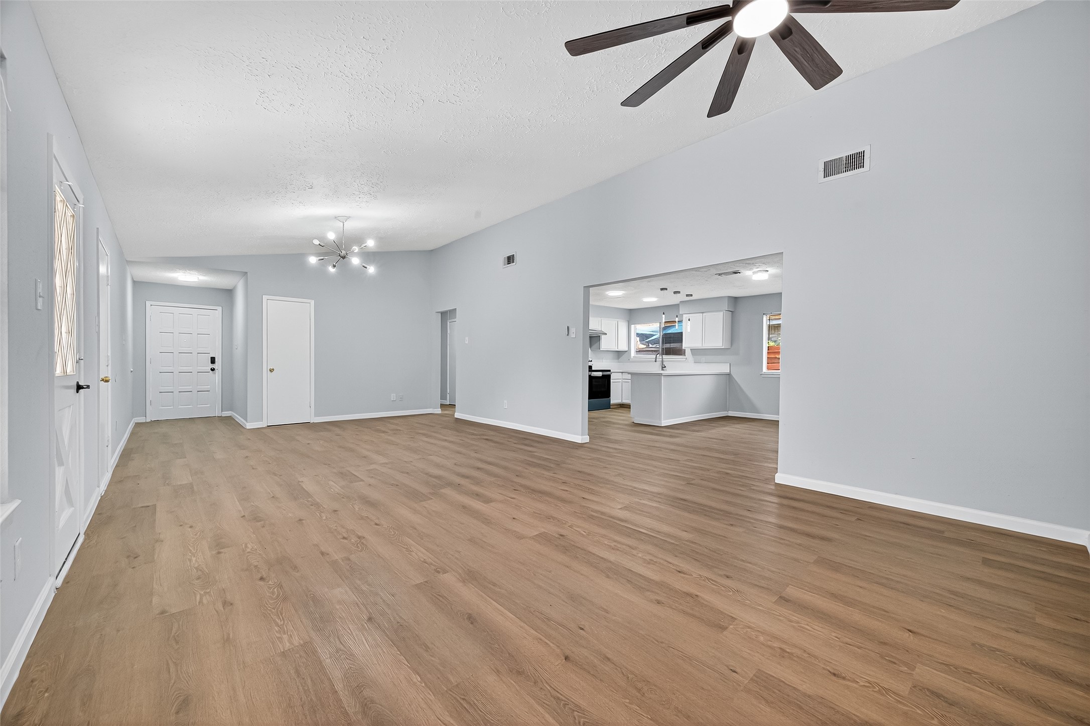 11622 Old Telegraph Road Houston, TX 77067 - Photo 10 of 38 a view of empty room with wooden floor