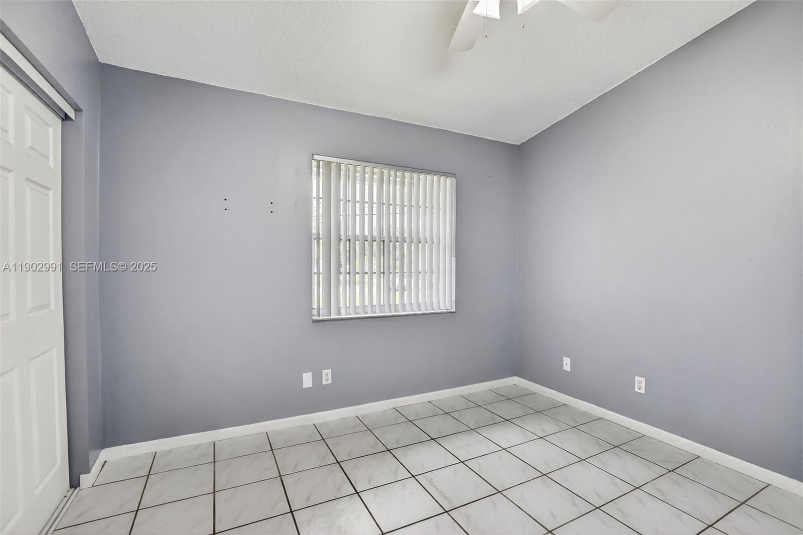 5010 Southwest 201st Terrace Southwest Ranches, FL 33332 - Photo 22 of 50 a view of an empty room and window