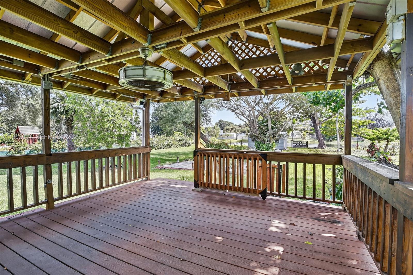 5010 Southwest 201st Terrace Southwest Ranches, FL 33332 - Photo 29 of 50 a view of porch with wooden floor