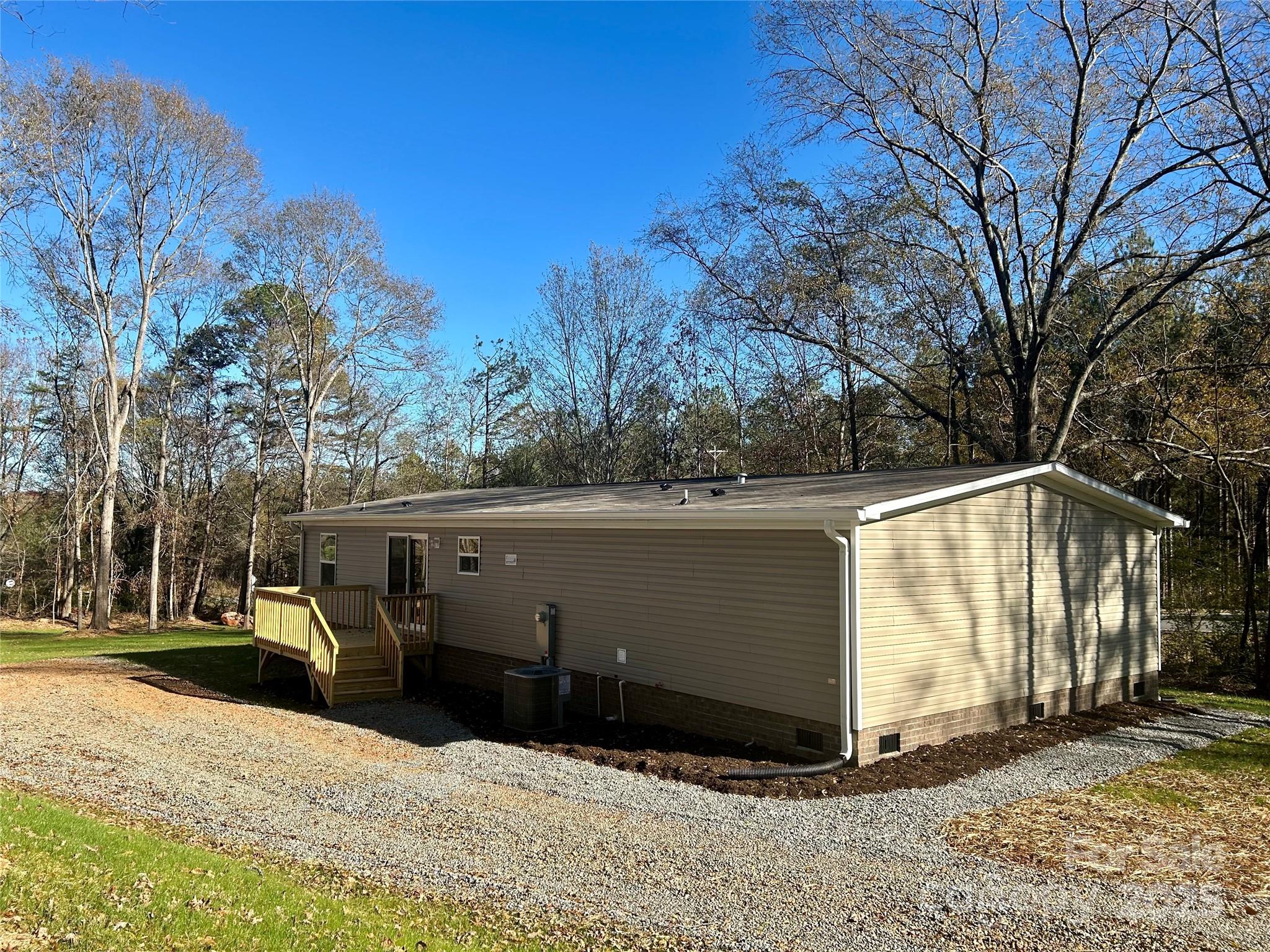 3336 Cliffside Road Mooresboro, NC 28114 - Photo 12 of 29 a view of a house with a yard