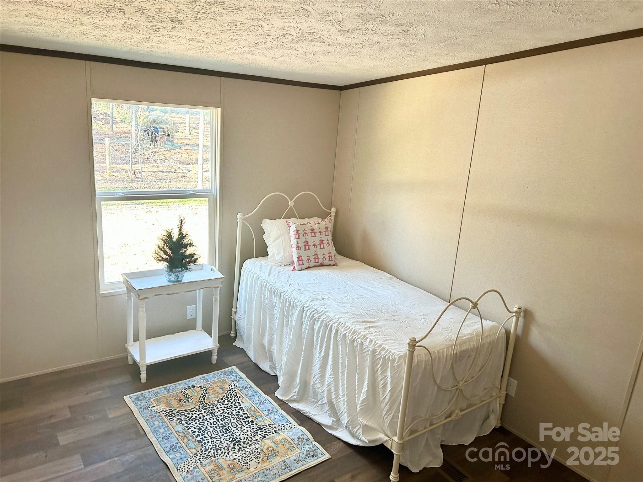 3336 Cliffside Road Mooresboro, NC 28114 - Photo 15 of 29 a bedroom with a bed and a window