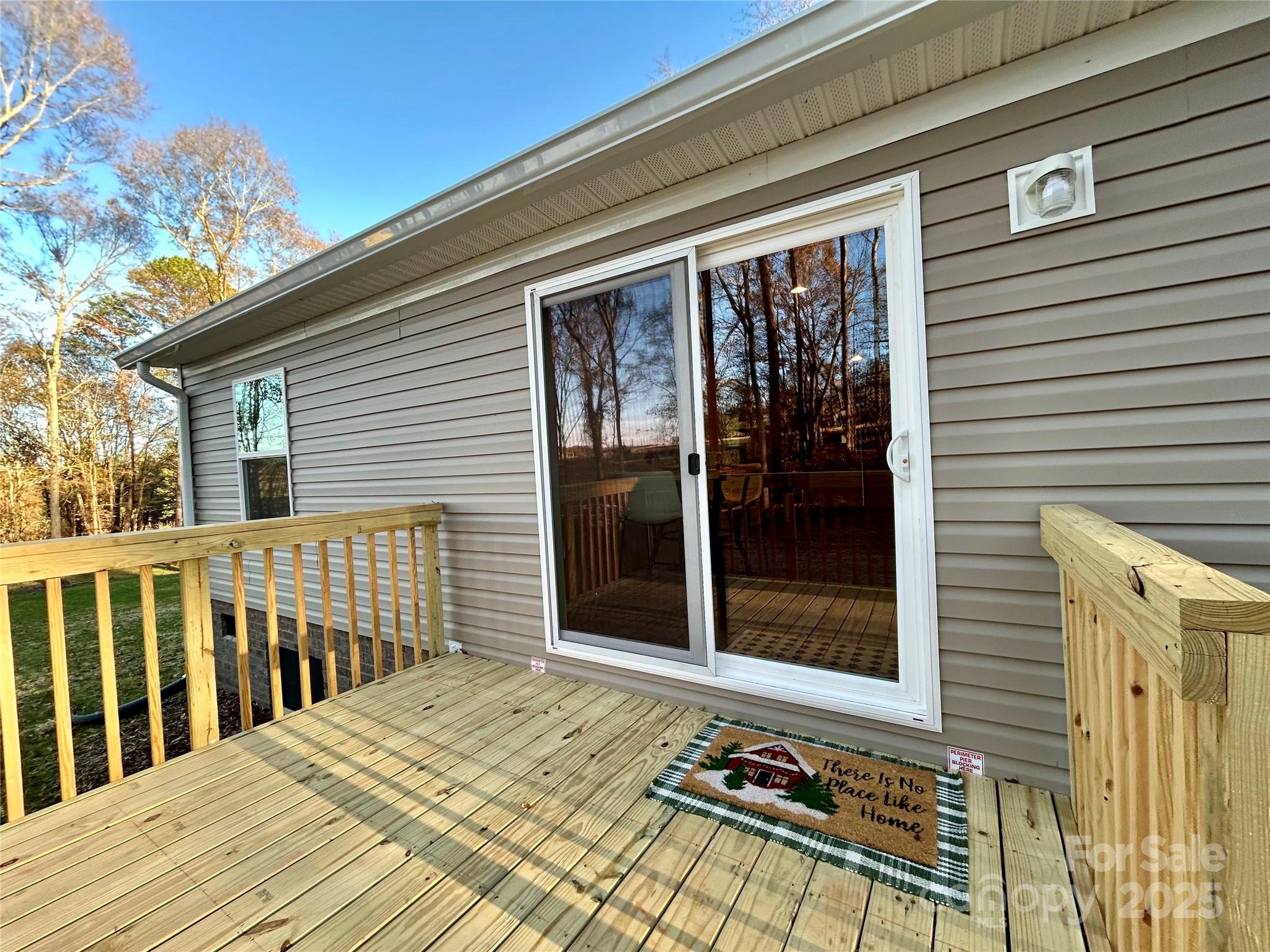 3336 Cliffside Road Mooresboro, NC 28114 - Photo 26 of 29 a front view of a house with a balcony