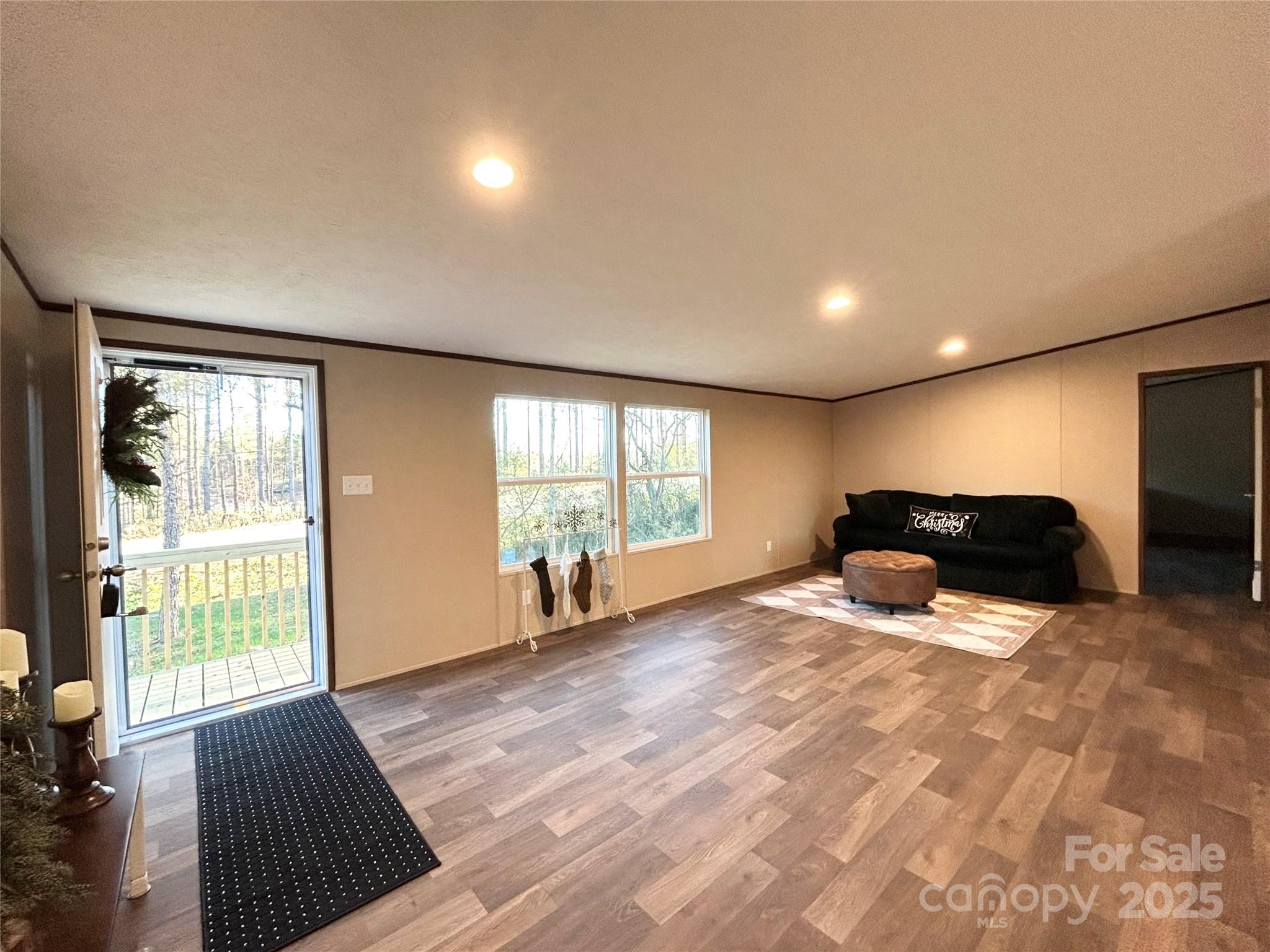 3336 Cliffside Road Mooresboro, NC 28114 - Photo 5 of 29 a large bedroom with a bed and a large window