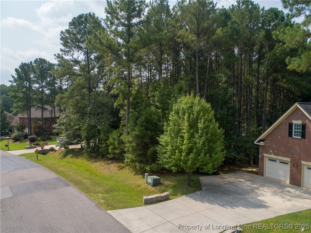 35 Barons (112) Run Spring Lake Spring Lake, NC 28390 - Photo 2 of 12 a view of a house with a yard and sitting area