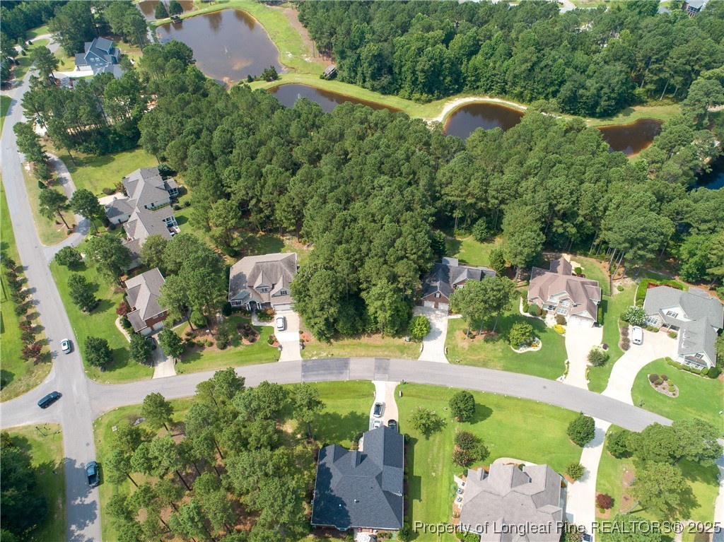 35 Barons (112) Run Spring Lake Spring Lake, NC 28390 - Photo 5 of 12 an aerial view of a house with a yard and lake view