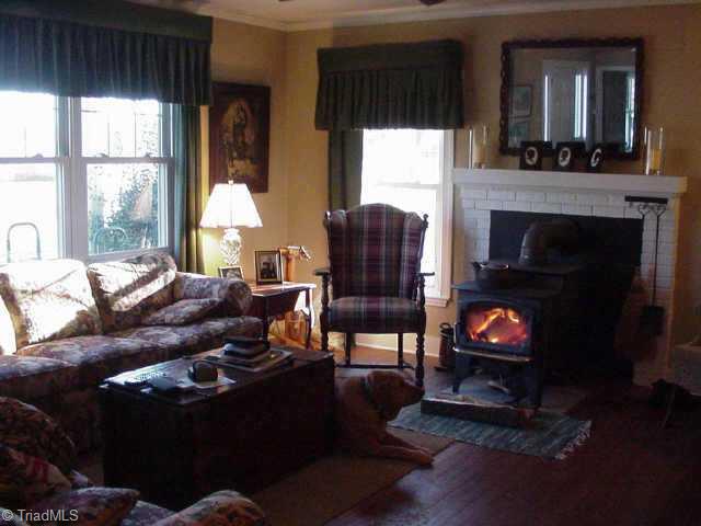 6406 Monnett Road Climax, NC 27233 - Photo 5 of 8 Other. Living room with wood stove
