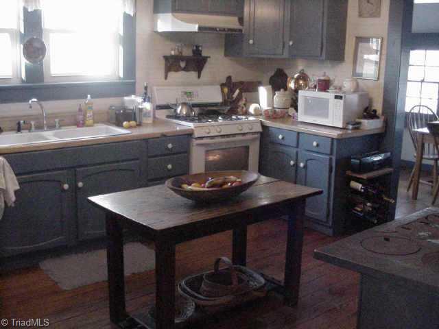 6406 Monnett Road Climax, NC 27233 - Photo 7 of 8 Other. Kitchen with wood floors