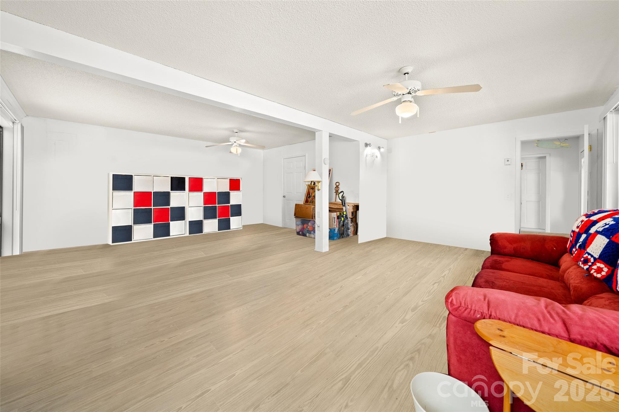 53 Hackberry Lane Waynesville, NC 28785 - Photo 12 of 40 a living room with furniture and air hockey table