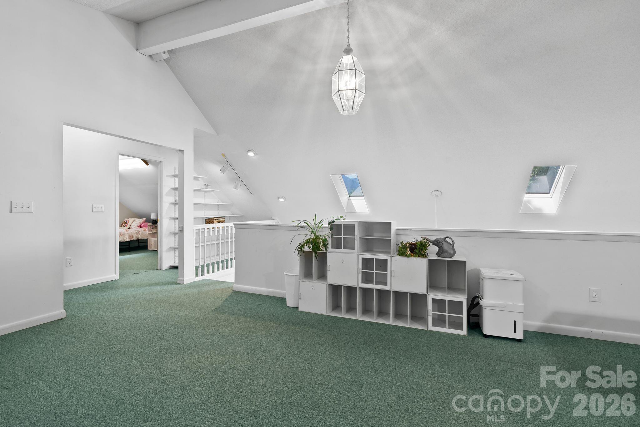 53 Hackberry Lane Waynesville, NC 28785 - Photo 17 of 40 a view of livingroom with furniture and staircase