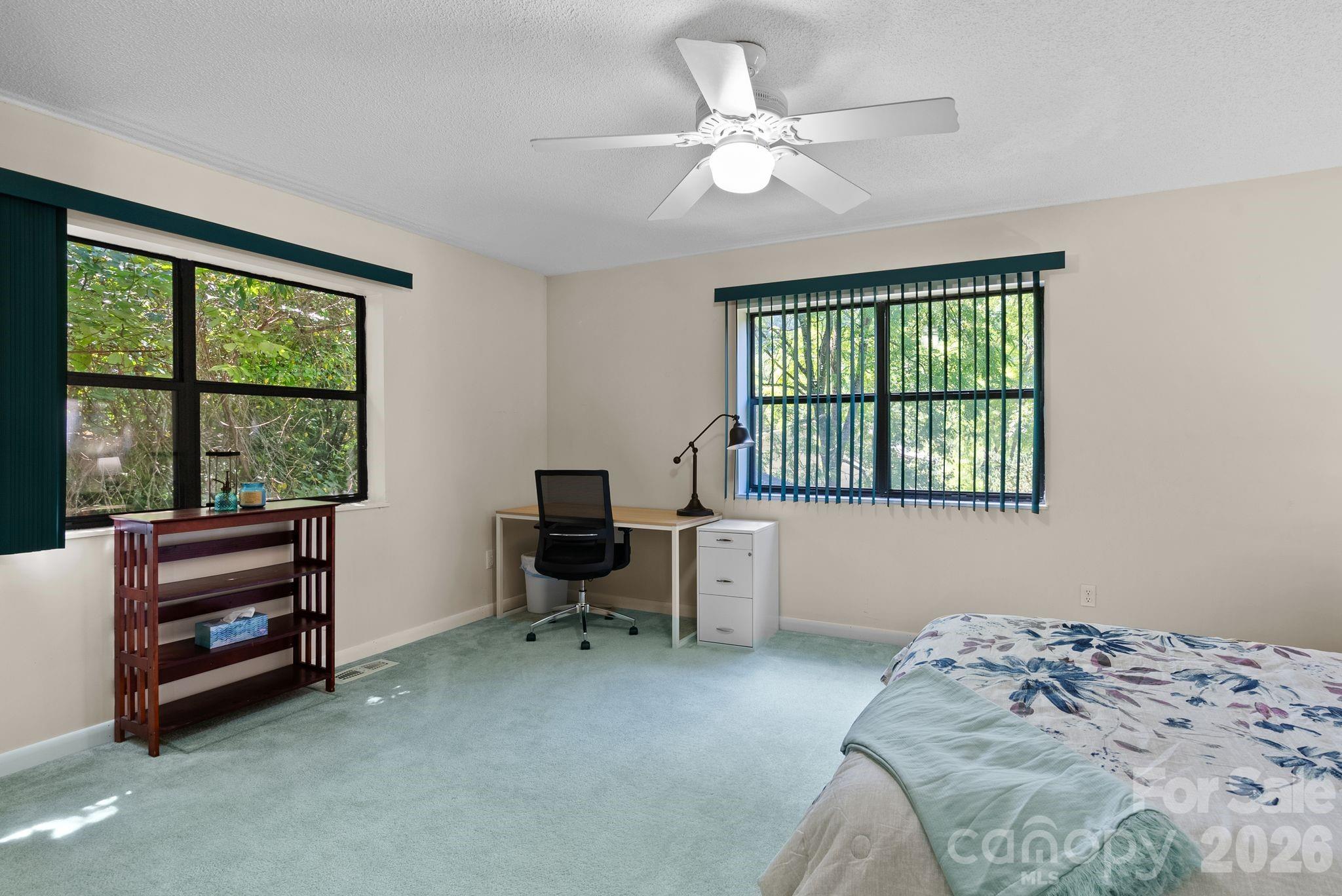 53 Hackberry Lane Waynesville, NC 28785 - Photo 20 of 40 a bedroom with a bed and a window