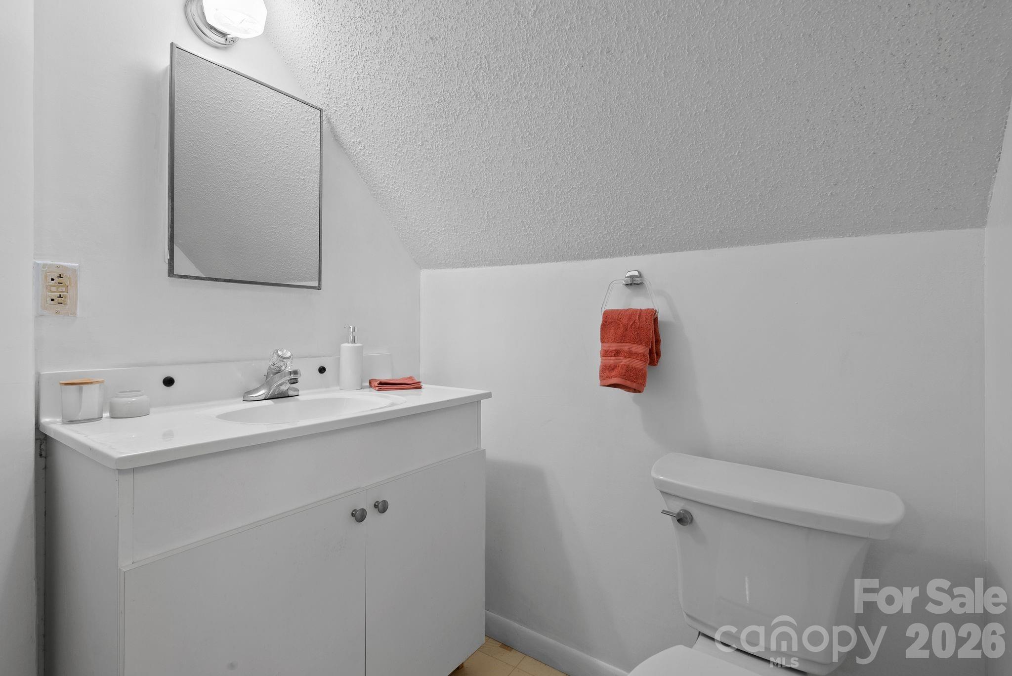 53 Hackberry Lane Waynesville, NC 28785 - Photo 21 of 40 a bathroom with a sink and a toilet