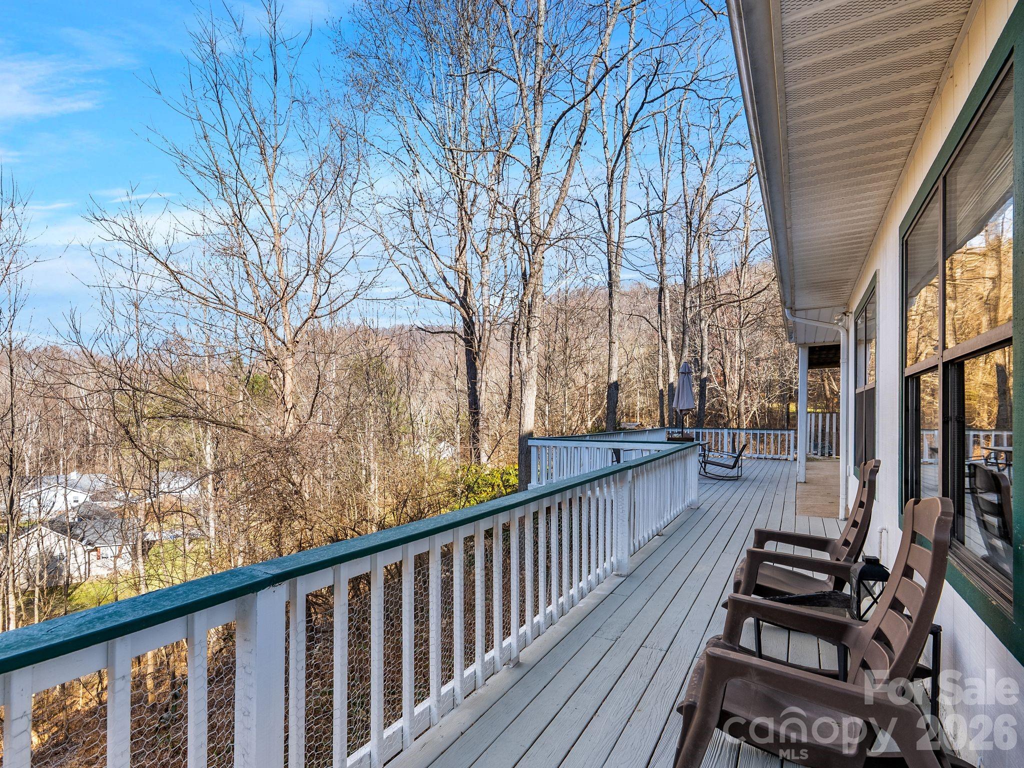 53 Hackberry Lane Waynesville, NC 28785 - Photo 30 of 40 a view of balcony with wooden floor and fence