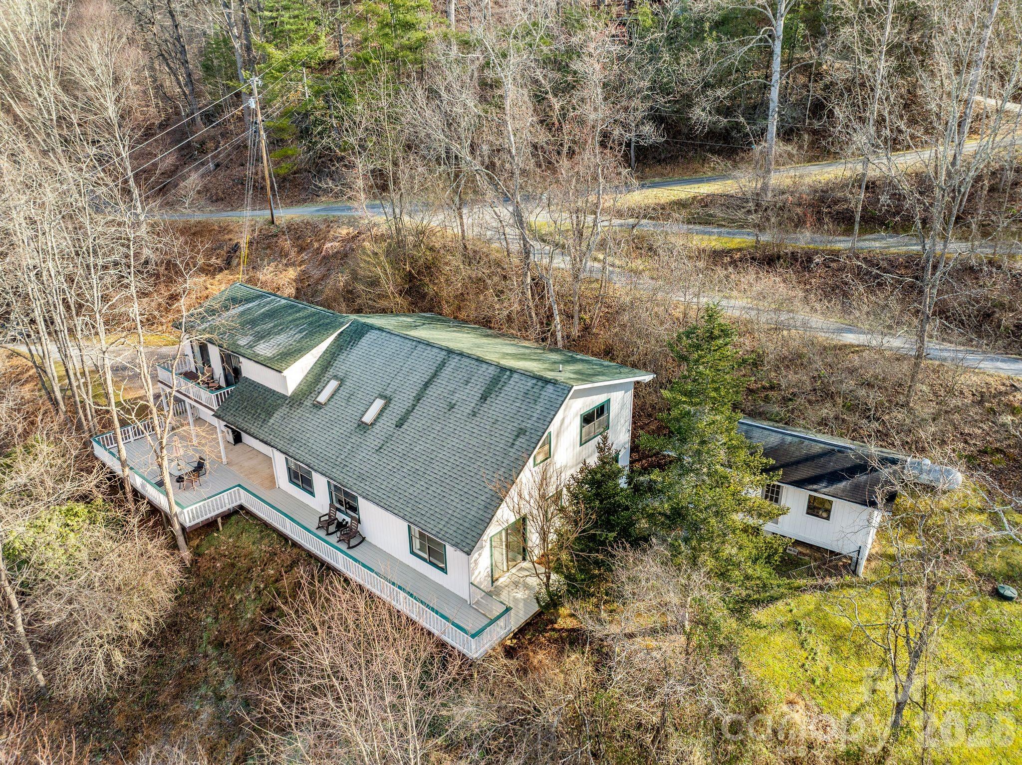 53 Hackberry Lane Waynesville, NC 28785 - Photo 34 of 40 an aerial view of a house with a yard