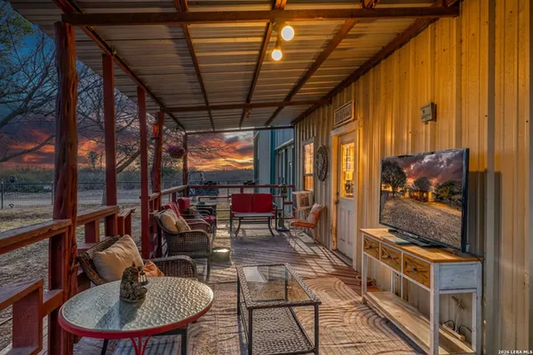 a living room with large windows