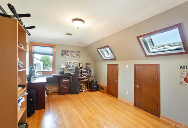 a bed room with furniture and a window