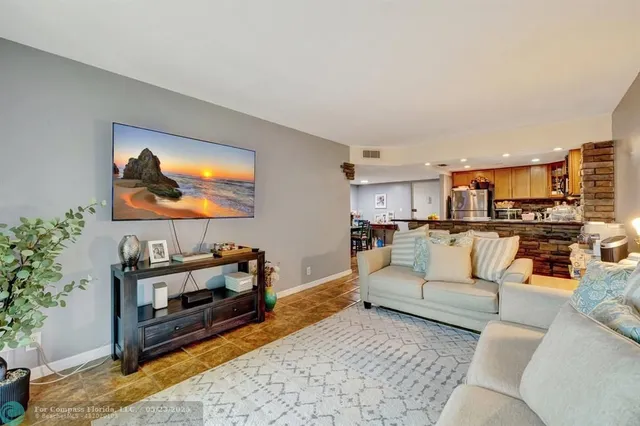 a living room with furniture and a couch