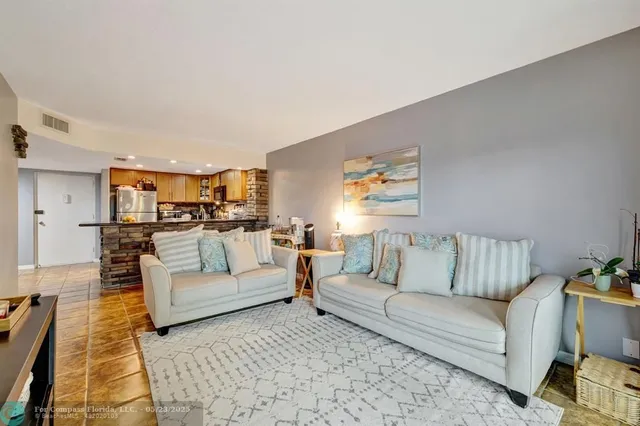 a living room with furniture and a couch