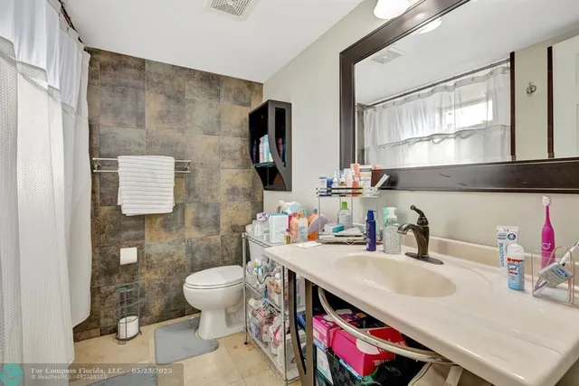 a view of a lake with a city