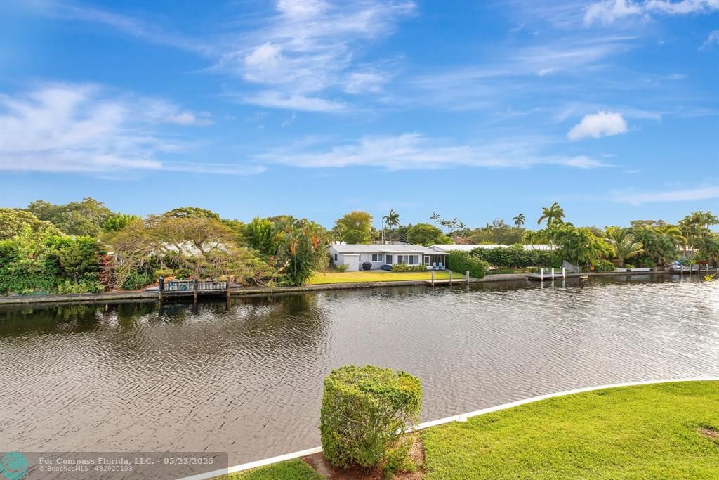 3004 Northeast 5th Terrace, Unit 208C Wilton Manors, FL 33334 - Photo 31 of 63 a view of a lake with a city