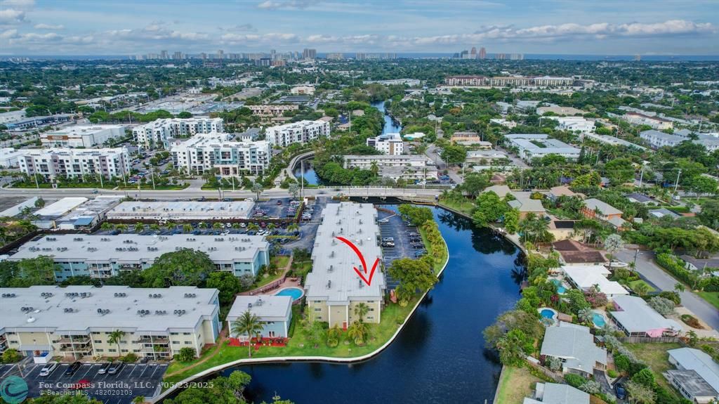 3004 Northeast 5th Terrace, Unit 208C Wilton Manors, FL 33334 - Photo 58 of 63 an aerial view of multiple house