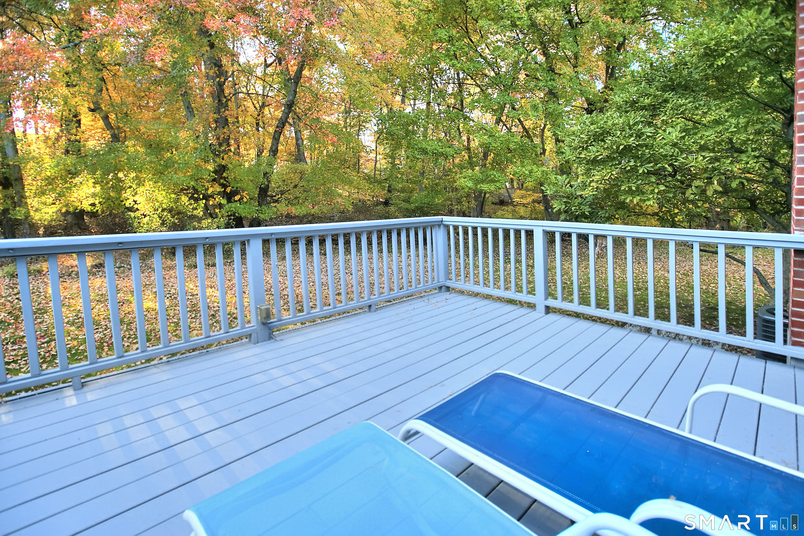 160 Glengarry Road, Unit 160 Fairfield, CT 06825 - Photo 18 of 31 a balcony with wooden floor