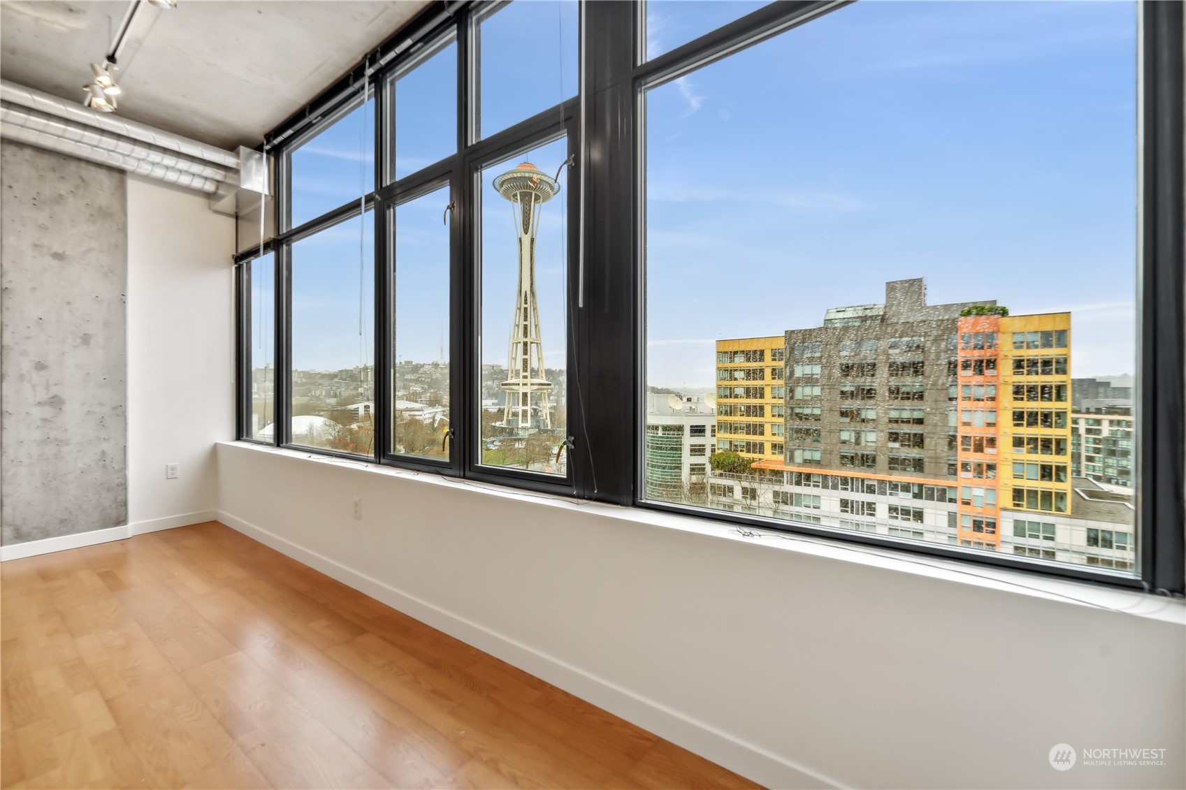 2720 3rd Avenue, Unit 1106 Seattle, WA 98121 - Photo 1 of 1 a view of an empty room with windows