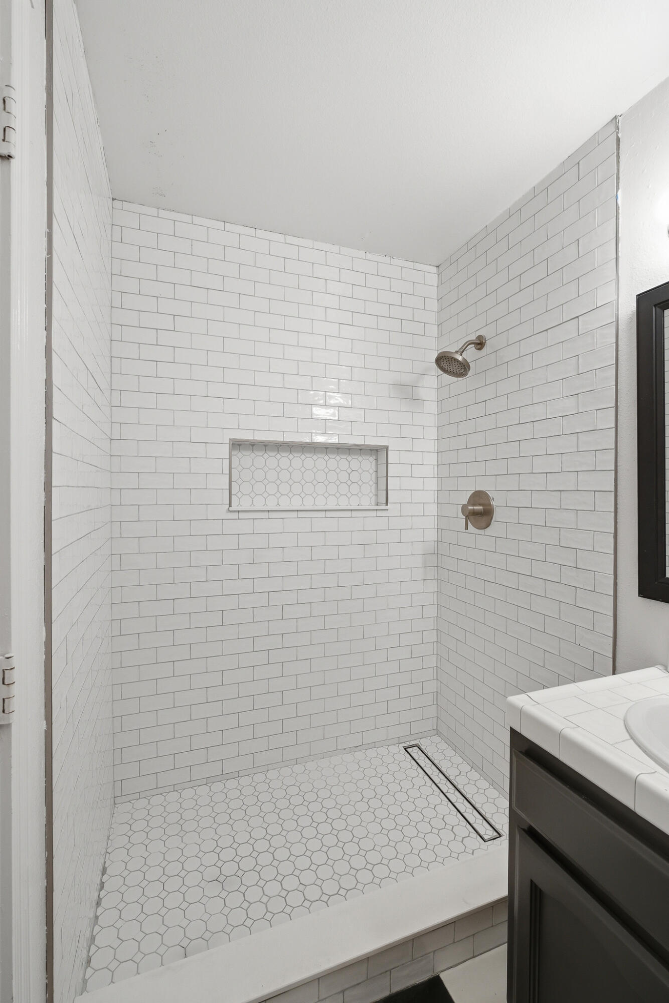 618 Birdsong Court Exeter, CA 93221 - Photo 30 of 62 a bathroom with a shower