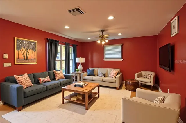 a view of a kitchen with furniture and a window