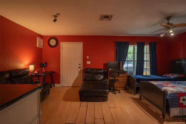 a kitchen that has a sink and a stove in it