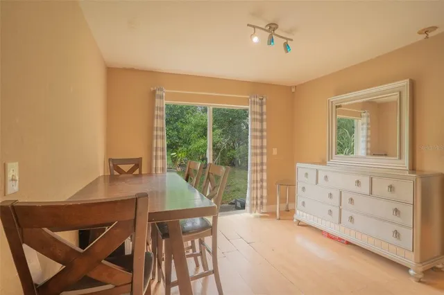 a kitchen with a sink stove and refrigerator