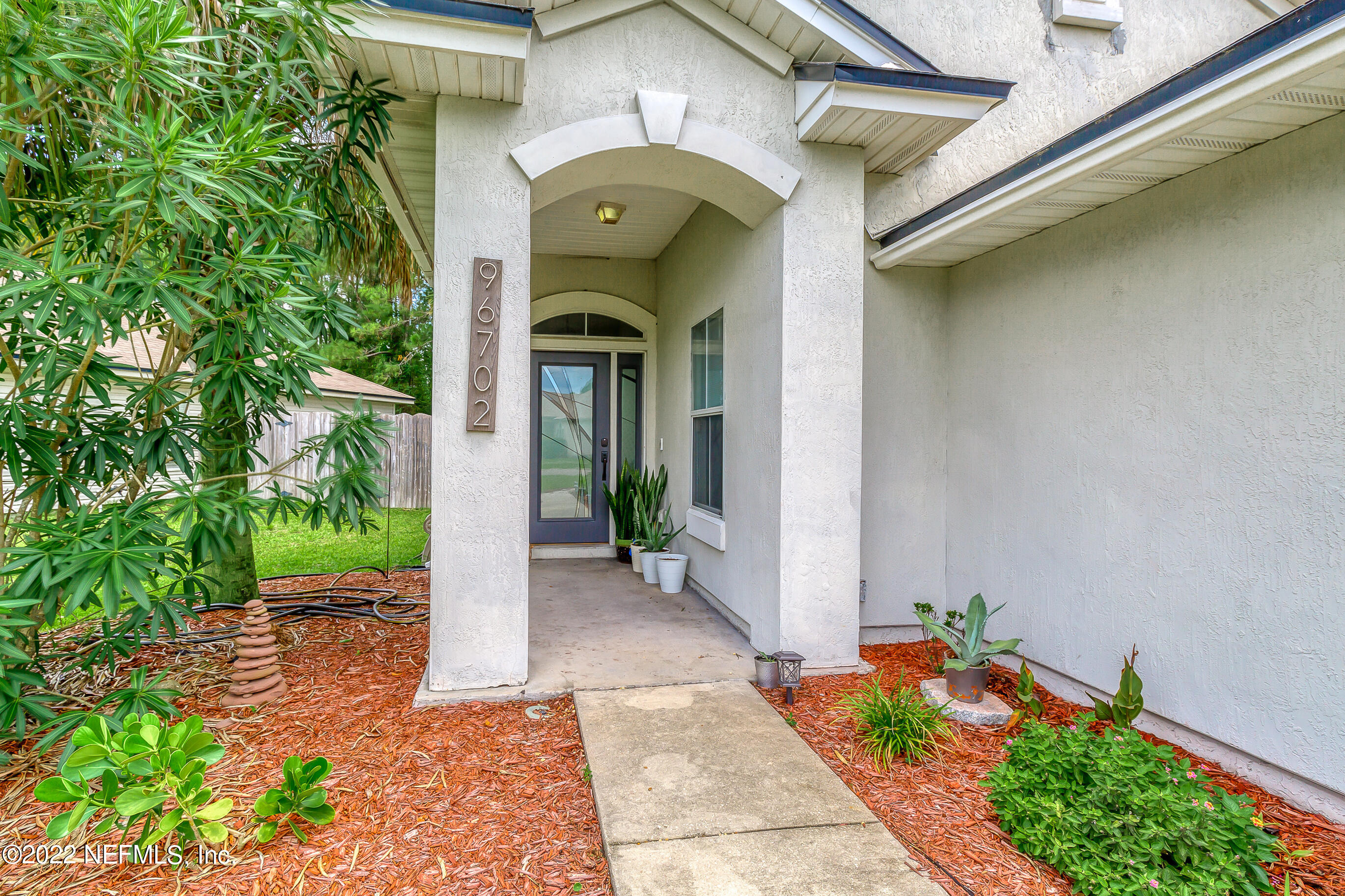 96702 Commodore Point Drive Yulee, FL 32097 - Photo 3 of 34 front porch
