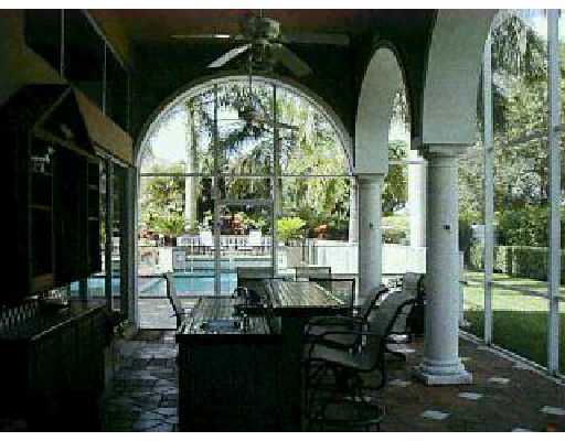 6517 Northwest 33rd Avenue Boca Raton, FL 33496 - Photo 3 of 3 a view of hall way with furniture