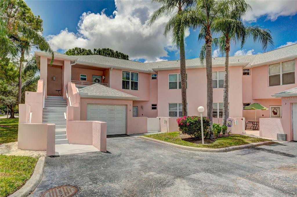 Beautiful ground level condo with one car garage plus extra storage area.